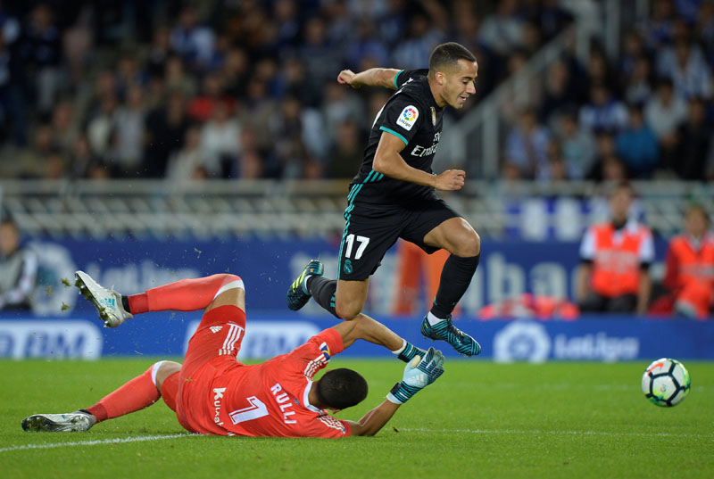 Real Sociedad's Geronimo Rulli in action with Real Madrid's Lucas Vazquez. Photo: Reuters