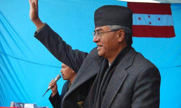 File: Nepali Congress President Sher Bahadur Deuba waves hand to crowd during a mass rally in Kathmandu. Courtesy: NC Central Office