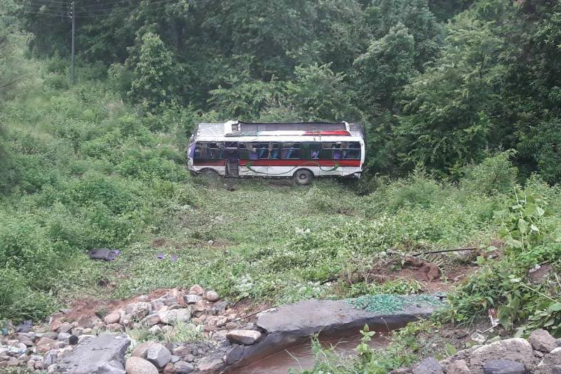 A view of wrecked bus (Lu 1 Kha 6623) after it fell about 50 metres below the road, on Tuesday, September 12, 2017. The bus was en route from Kathmandu to Triveni in Nawalparasi, along the Prithvi Highway. Photo: Keshav Adhikari