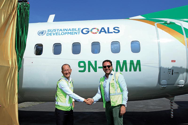Yeti Airlines CEO Umesh Chandra Rai and UNDP Country Direrctor Renaud Meyer shaking hands after unveiling SDG-branded Yeti Airlines Plane, in Kathmandu, on Monday. Photo: THT