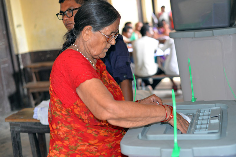 An elderly is seen casting her vote in Birgunj Metropolis City during the third phase of local polls, on Monday, September 18, 2017. Photo: RSS