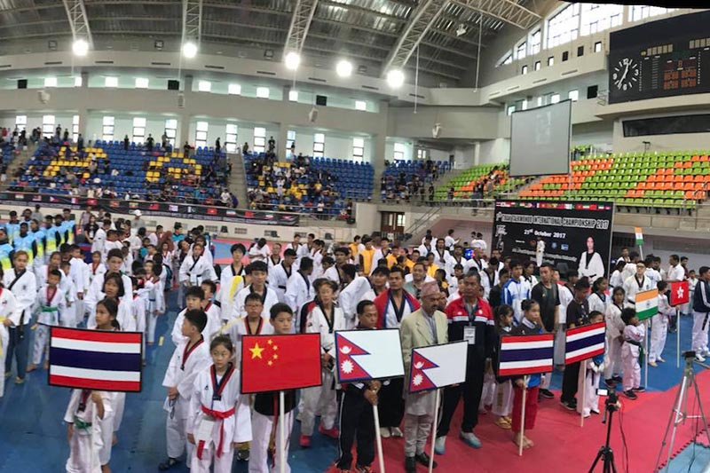 Participants including Nepali Taekwondo team take part in assembly of 7th Tirak International Taekwando Championship at John Paul II Sports Centre, Assumption University in Bangkok, Thailand, on Saturday, October 21, 2017. Photo: Tirak Taekwondo Facebook