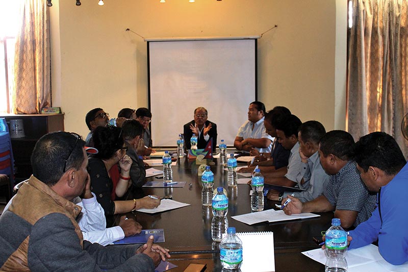 ANFA President Narendra Shrestha (centre) speaks during the executive committee meeting in Lalitpur on Monday.