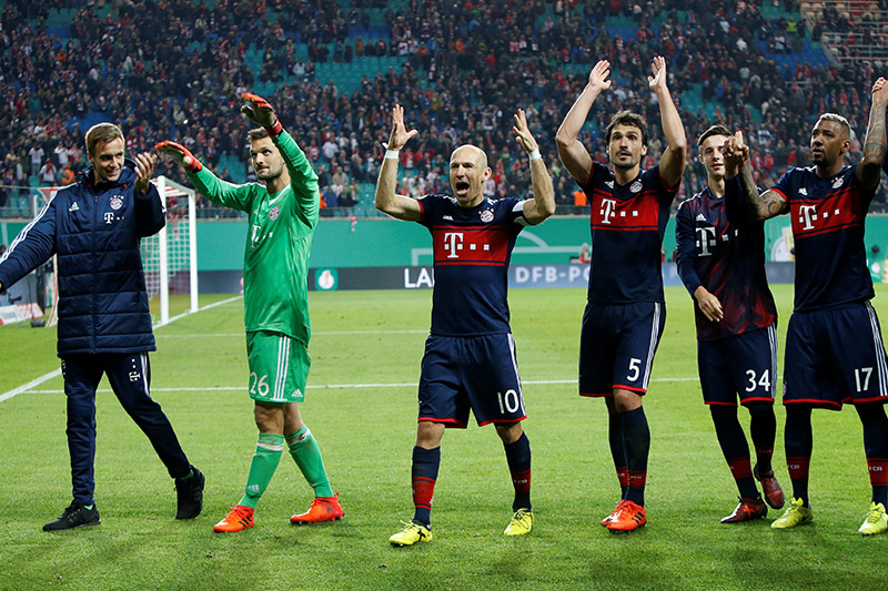 Bayern Munich's Sven Ulreich, Arjen Robben, Mats Hummels, Marco Friedl and Jerome Boateng celebrate winning the penalty shootout. Photo: Reuters