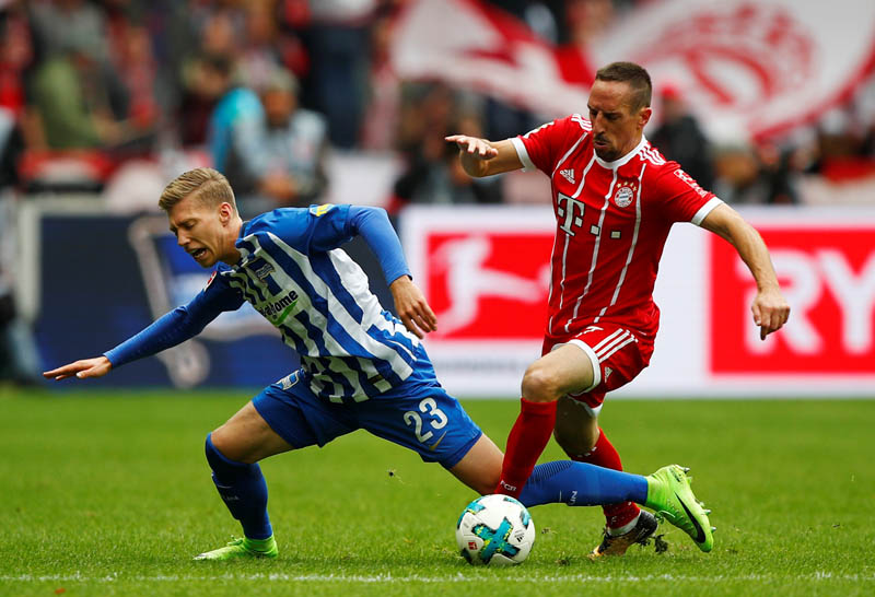 Bayern Frank Ribery dribbles past Hertha Berlin player during Bundesliga game in Germany on Sunday, October 1, 2017. Photo: Reuters