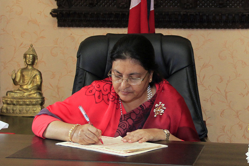 President Bidya Devi Bhandari certifies various bills endorsed by the Legislature-Parliament, at her office in Sheetal Niwas in Kathmandu, on Monday, October 16, 2017. Courtesy: President's Office