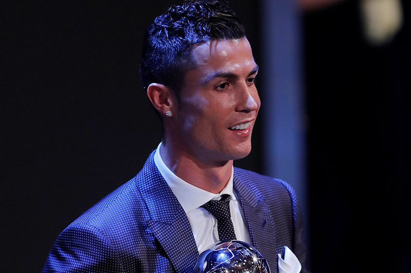 Real Madridu2019s Cristiano Ronaldo celebrates after winning The Best FIFA Menu2019s Player Award. Photo: Reuters