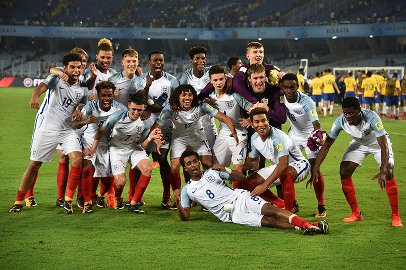 England's team celebrates their win. Photo: Reuters