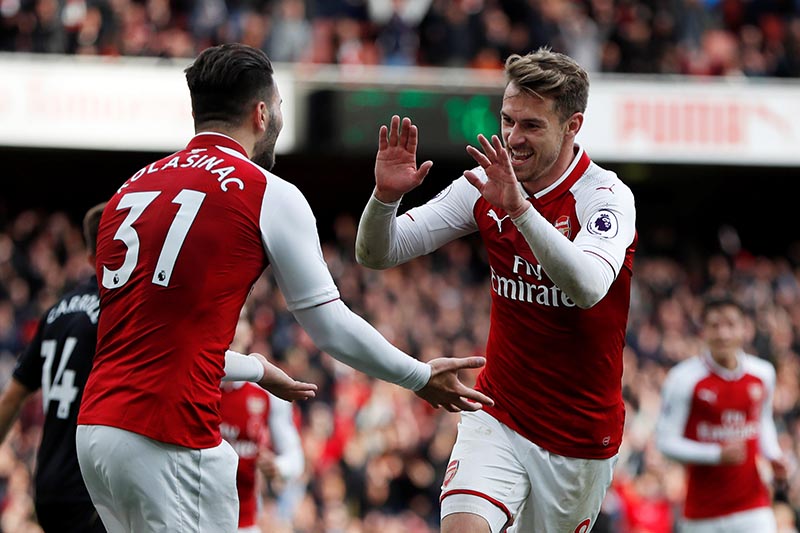 Arsenal's Aaron Ramsey celebrates scoring their second goal with Sead Kolasinac during the Premier League match between Arsenal and Swansea City, at Emirates Stadium, in London, Britain, on October 28, 2017. Photo: Action Images via Reuters