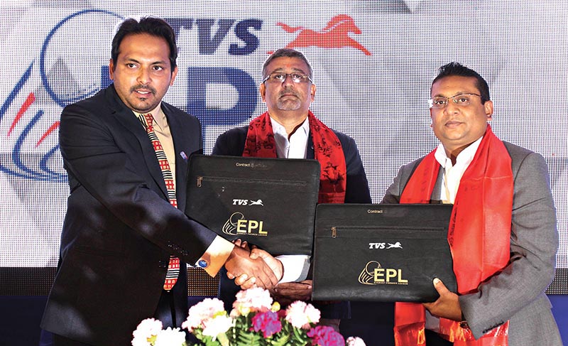 EPL MD Aamir Akhtar (left) exchanges the Memorandum of Understanding with Jagadamba Motors MD Shahil Agrawal as Senior Vice-president, International Business at TVS Motors Company R Dilip (centre) looks on during the signing ceremony in Kathmandu on Tuesday. Photo: THT