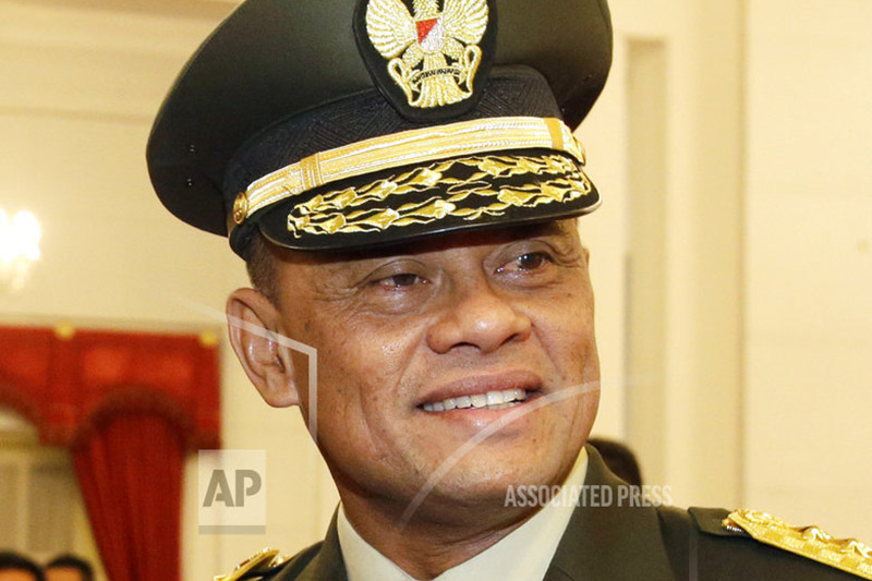 FILE - In this Wednesday, July 8, 2015 file photo, Indonesian Armed Forces Chief Gen. Gatot Nurmantyo pose for a photo after his swearing-in ceremony at the presidential palace in Jakarta, Indonesia. Photo: AP