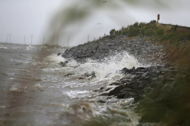 Gulf Coast waves crash against rocks as winds continue to speed up in Coden, Ala., on Saturday, Oct. 7, 2017, ahead of Hurricane Nate, expected to make landfall on the Gulf Coast later in the day. Photo: AP