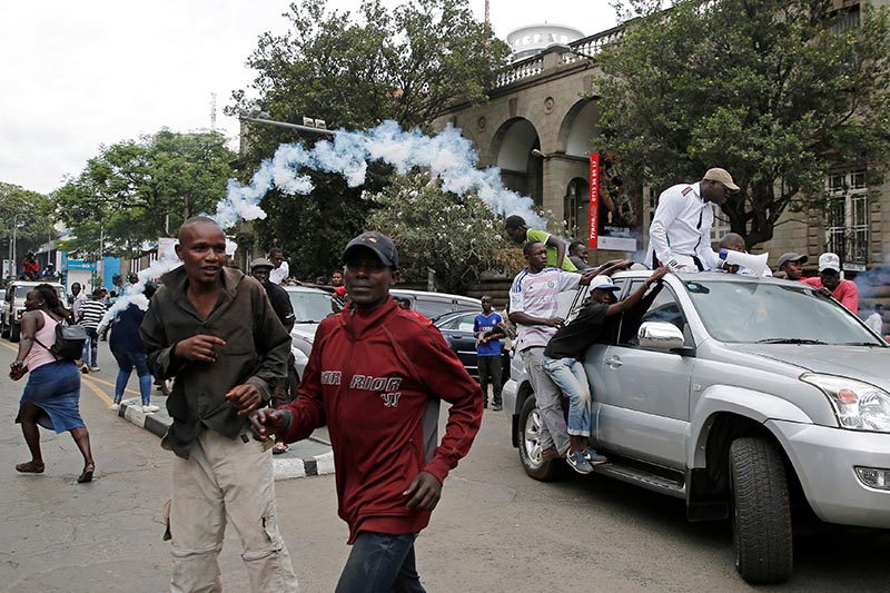 Tear gas is fired at a convoy of opposition politicians and supporters of the National Super Alliance (NASA) coalition during a protest along a street in Nairobi, Kenya, on October 24, 2017. Photo: Reuters