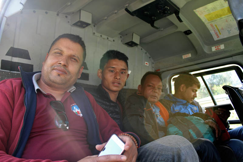 The injured of Manang jeep accident gesture for the camera before being airlifted to Kathmandu for treatment, in Manang, on Monday, October 9, 2017. Photo: Ramji Rana