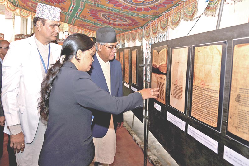 Prime Minister Sher Bahadur Deuba inspecting manuscripts at National Archives, in Kathmandu, on Tuesday, October 10, 2017. Photo: RSS