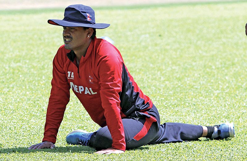 Nepal national cricket team vice-captain Gyanendra Malla stretches during a training session in Hong Kong on Saturday. Photo Courtesy: CricketingNepal.com