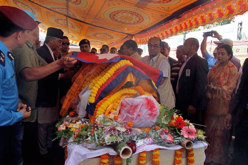 Prime Minister Shar Bahadur Deuba pays final tribute to President of Federation of Contractors Association Nepal (FCAN) in Anamnagar, on Thursday, October 12, 2017. Photo: THT Online