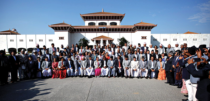Prime Minister Sher Bahadur Deuba (centre) with members of the Parliament posing for a group photograph on the last day of the Legislature-Parliamentu2019s term, in Kathmandu, on Saturday.Skanda Gautam / THT