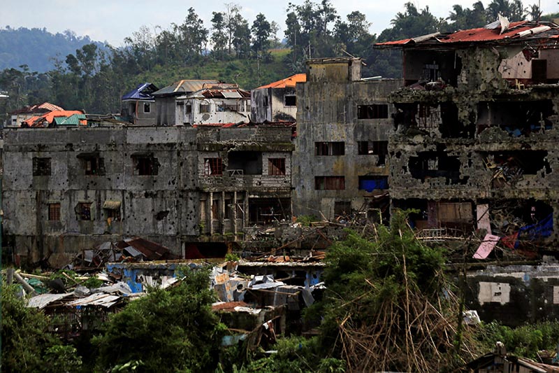 Damaged houses and buildings are seen after government troops cleared the area from pro-Islamic State militant groups inside the war-torn area in Saduc proper, Marawi city, southern Philippines, on October 22, 2017. Photo: Reuters