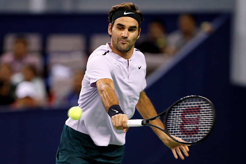 Roger Federer of Switzerland in action against Rafael Nadal of Spain. Photo: Reuters