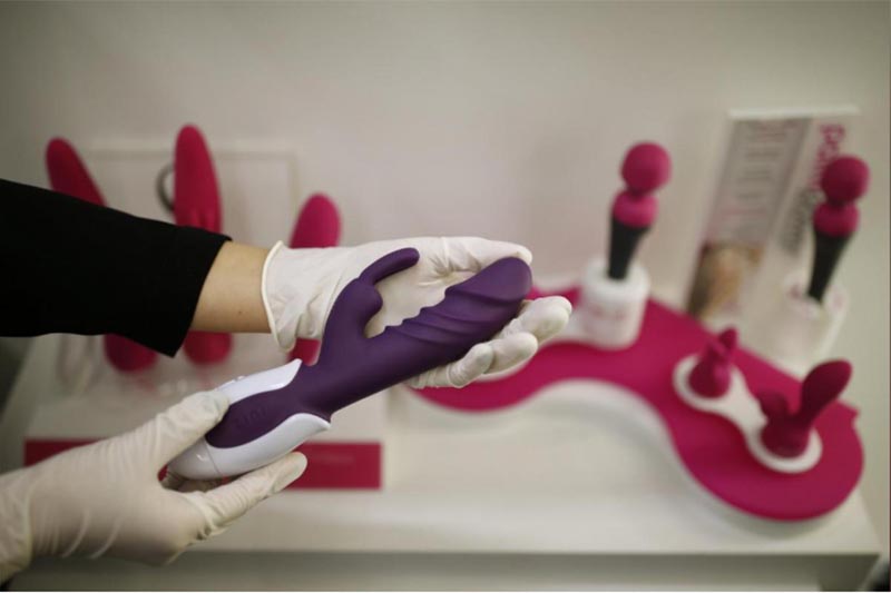 Choi Jung-yoon shows a product at her sex toy shop in Seoul, South Korea, on December 16, 2015. Photo: Reuters