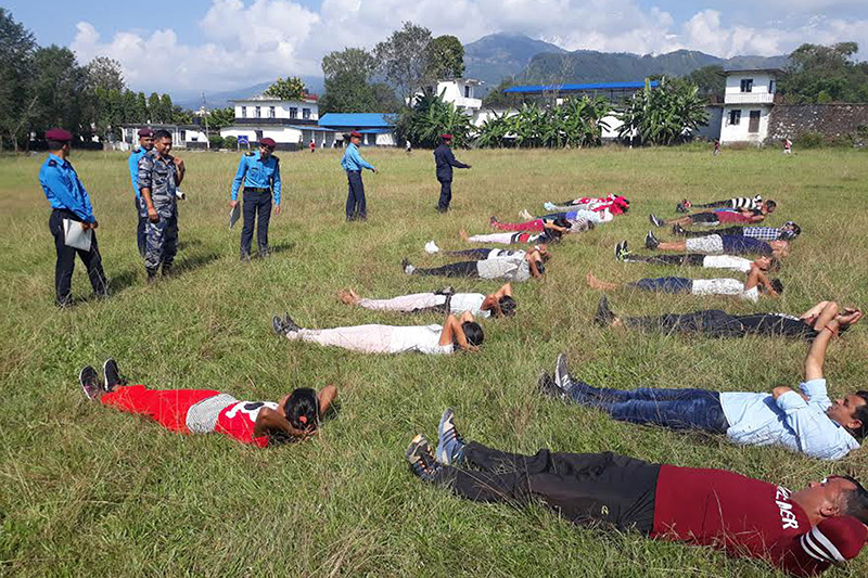 Temporary police aspirants undergoing physical training in Pokhara, on Monday, October 23, 2017. Photo: RSS