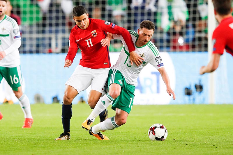 Mohammed Elyounoussi of Norway against Corry Evans of Northern Ireland during 2018 World Cup Qualifiers match between Norway and Northern Ireland, at Ullevaal Stadium, in Olso, Norway, on October 8, 2017. Photo: NTB Scanpix/Cornelius Poppe via Reuters