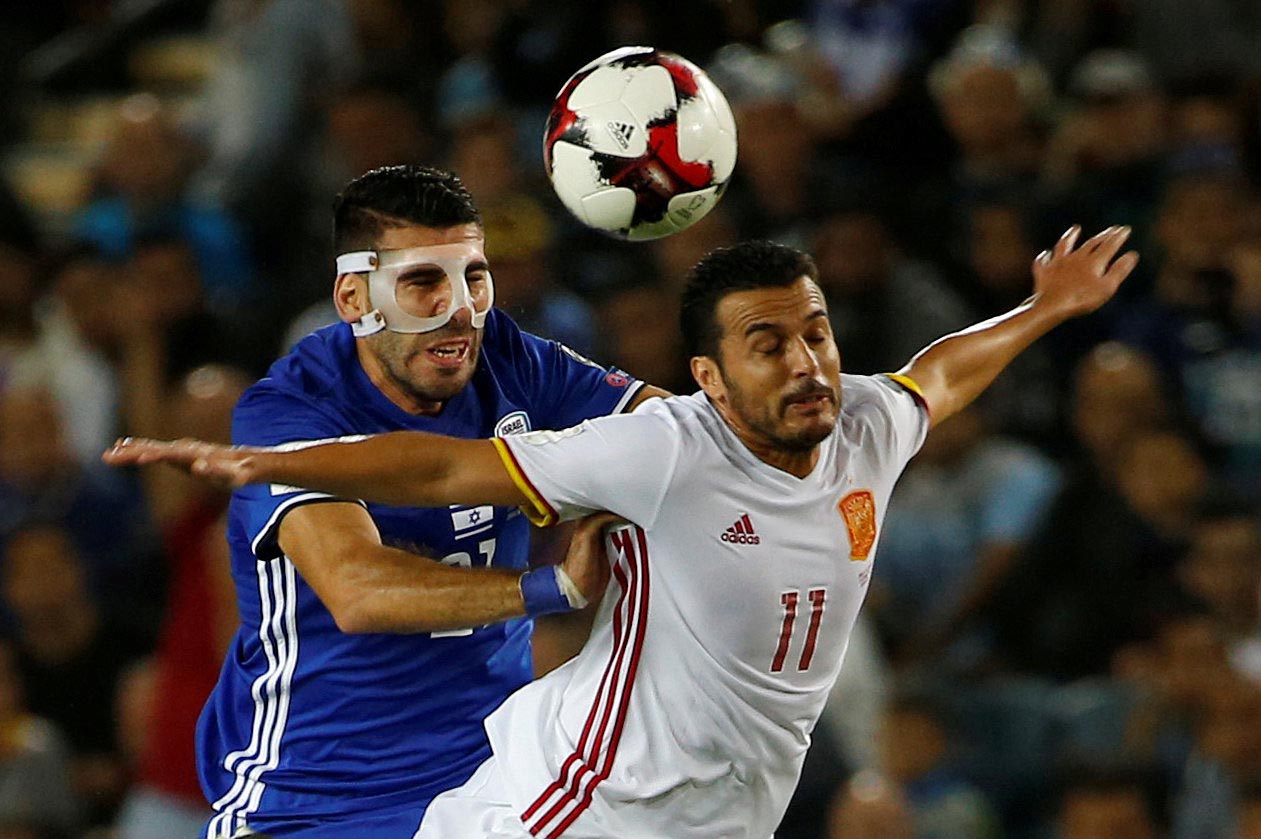 Israelu2019s Eitan Tibi in action with Spainu2019s Pedro during the 2018 World Cup Europe Qualification match between Israel and Spain, at Teddy Stadium, Jerusalem, Israel, on October 9, 2017. Photo: Reuters