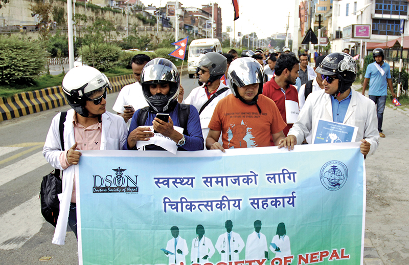 Agitating doctors taking out a rally, in Kathmandu, on Saturday,