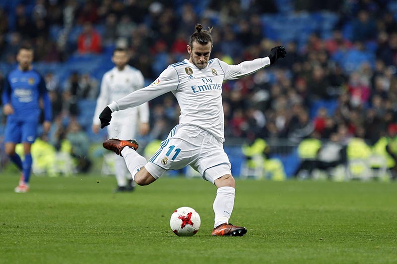 Real Madrid's Gareth Bale shoots the ball during a Spanish Copa del Rey round of 32 second leg soccer match between Real Madrid and Fuenlabrada at the Santiago Bernabeu stadium in Madrid, on Tuesday, November 28, 2017. Photo: AP