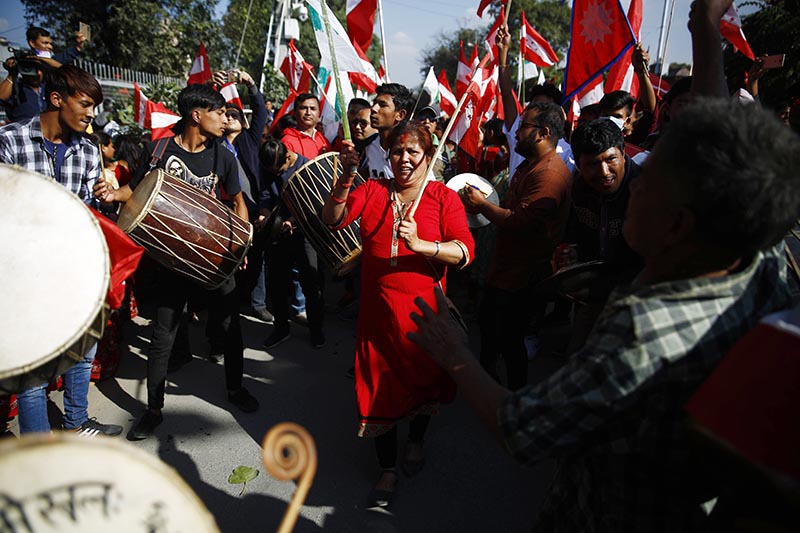 Activists holding flags of their parties while taking part in rallies accompanying leaders to file nomination papers for the second phase of parliamentary and provincial polls, in Kathmandu, on Thursday, November 2, 2017. Photo: Skanda Gautam/THT