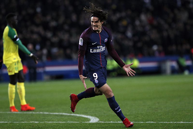 PSG's Edinson Cavani celebrates after he scored a goal during his French League One soccer match between Paris-Saint-Germain and Nantes, at the Parc des Princes stadium in Paris, France, on Saturday, November18, 2017. Photo: AP