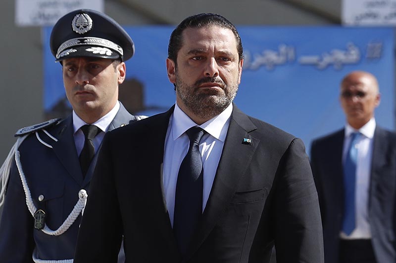 Lebanese Prime Minister Saad Hariri (left), arrives for a mass funeral of ten Lebanese soldiers at the Lebanese Defense Ministry, in Yarzeh near Beirut, Lebanon, on Friday, September 8, 2017. Photo: AP/ File