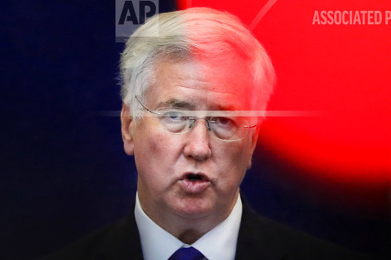 FILE - In this file photo dated Thursday, June 15, 2017, Britain's defense minister Michael Fallon speaks at the Romanian defense ministry in Bucharest, Romania. Photo: AP