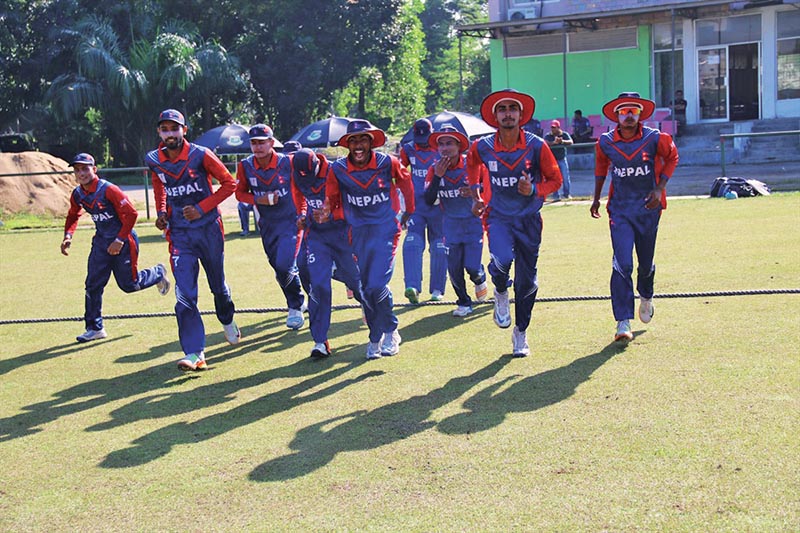 Nepal U-19 cricket team players enter the pitch to field against Bangladeshi youth side during their second friendly match in Dhaka on Saturday. Photo Courtesy: Raman Shiwakoti