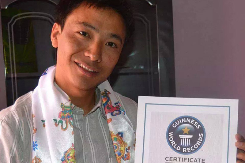 Pemba Dorje Sherpa with the Guinness World Records Certificate of the fastest Everest summit. Photo: Pemba Dorje Sherpa/Facebook