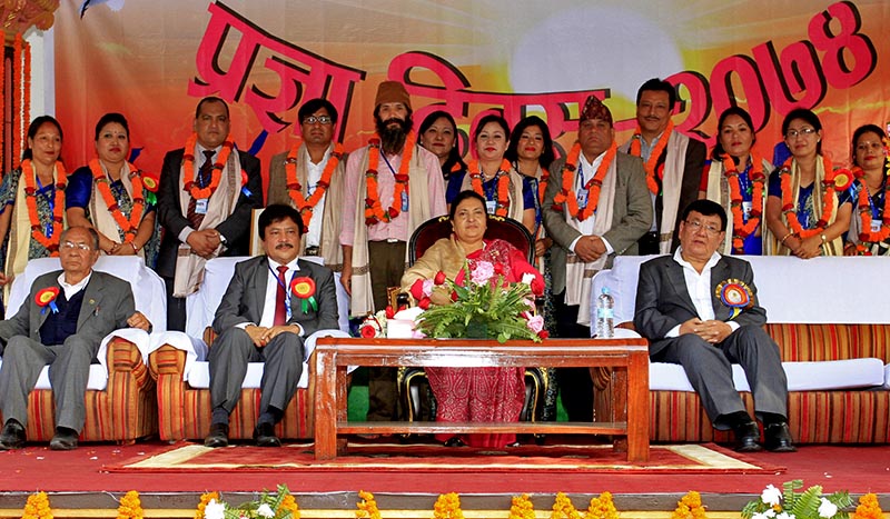 President Bidhya Devi Bhandari (centre), Sanduk Ruit (right) along with the teachers and staff of Siddhartha Vanasthali Institute, posing for a picture during the Academic Day programme at the Siddhartha Vanasthali Institute in Balaju, Kathmandu, on Saturday, November 4, 2017. Photo: RSS