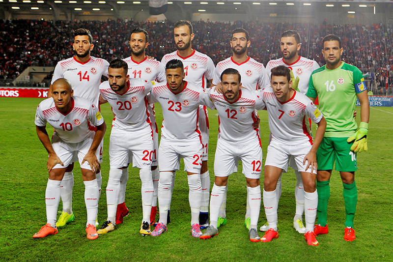 Tunisia players pose for a team photo. Photo: Reuters