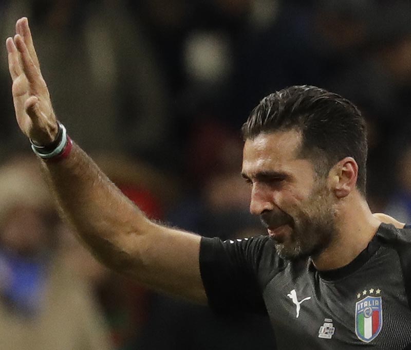Italy's goalkeeper Gianluigi Buffon waves as he leaves the pitch after the elimination of his team in the World Cup qualifying play-off second leg soccer match between Italy and Sweden, at the Milan San Siro stadium, Italy, on Monday, November 13, 2017. Photo: AP