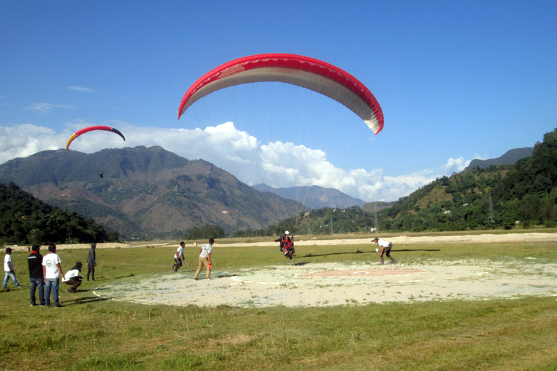 Participants take part in international open paragliding competition in Sorek of Syangja district, on Tuesday, Nevember 7, 2017. Photo: Rishi Ram Baral