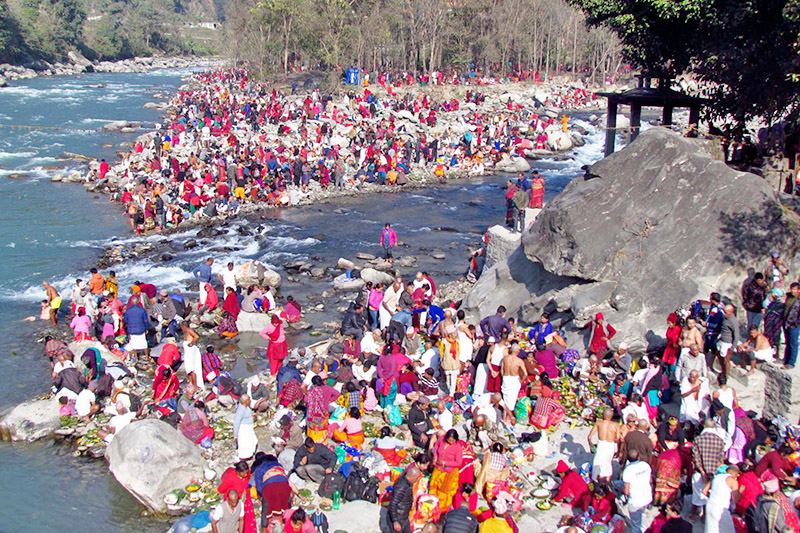 Devotees throng at the confluence of Betrawati Uttargaya on the occasion of Paise Aausi in Nuwakot district, on Monday, December 18, 2017. Photo: RSS