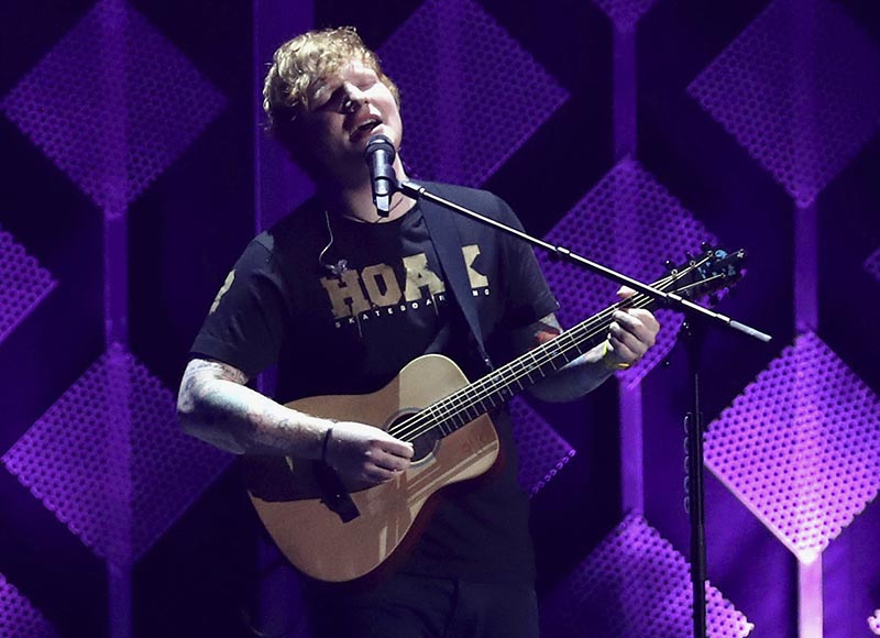 Ed Sheeran performs at Jingle Ball at The Forum in Inglewood, California, on December 1, 2017. Photo: AP/ File