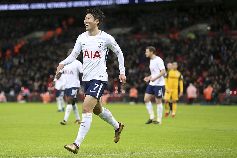 Tottenham Hotspur's Son Heung-Min celebrates scoring his side's second goal of the game against Brighton &amp; Hove Albion during their English Premier League soccer match at Wembley Stadium in London, on Wednesday December 13, 2017. Photo: Nigel French/PA via AP