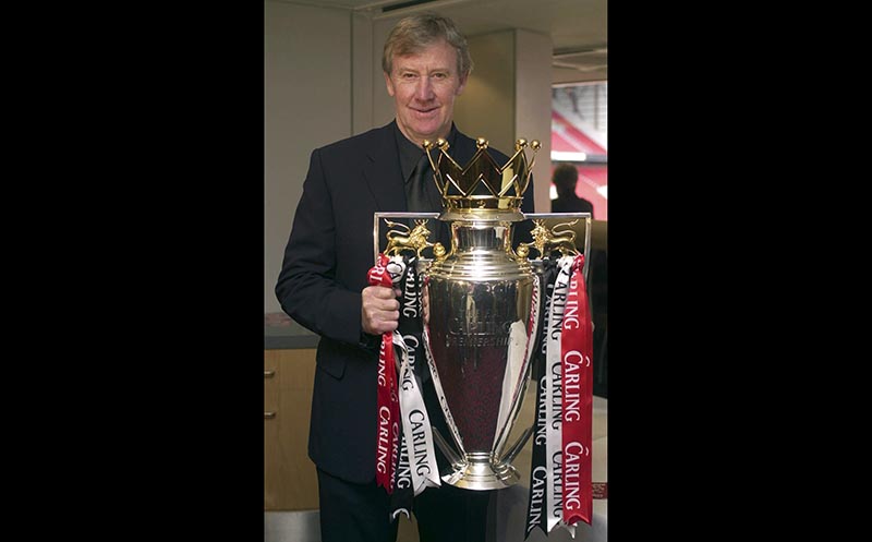 Soccer coach Eric Harrison poses with the Carling Cup, on March 1, 2001. Photo: Rui Vieira/PA via AP/ File
