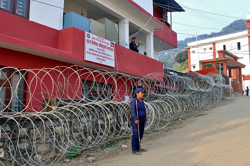 Police guarding the office of the Chief Returning Officer, in Gorkha district, on Saturday, December 2, 2017. The votes collected from  the first phase of the elections to the House of Representatives and State Assemblies in the district have been stored in the building. Photo: RSS