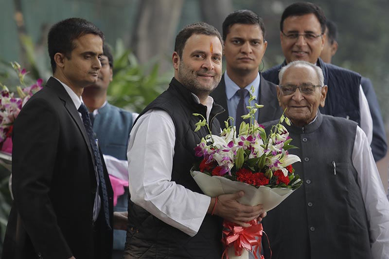 Senior Congress party leaders welcome their party vice president Rahul Gandhi , second left, with flowers as he arrives to file his nomination papers at party headquarters, in New Delhi, India, Monday, December 4, 2017. Photo: AP