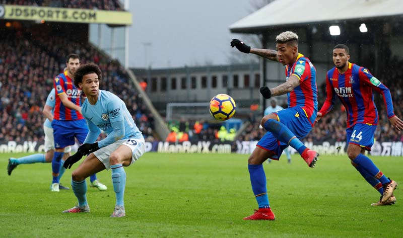 Crystal Palace vs Manchester City in English Premier League, Selhurst Park, London, Britain - December 31, 2017. Manchester City's Leroy Sane in action with Crystal Palace's Patrick van Aanholt. Photo: Reuters