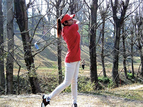 Tara Karki plays a shot during the RNGC Annual Ladies Caddie Golf Competition at the Royal Nepal Golf Club in Kathmandu on Sunday. Photo: THT