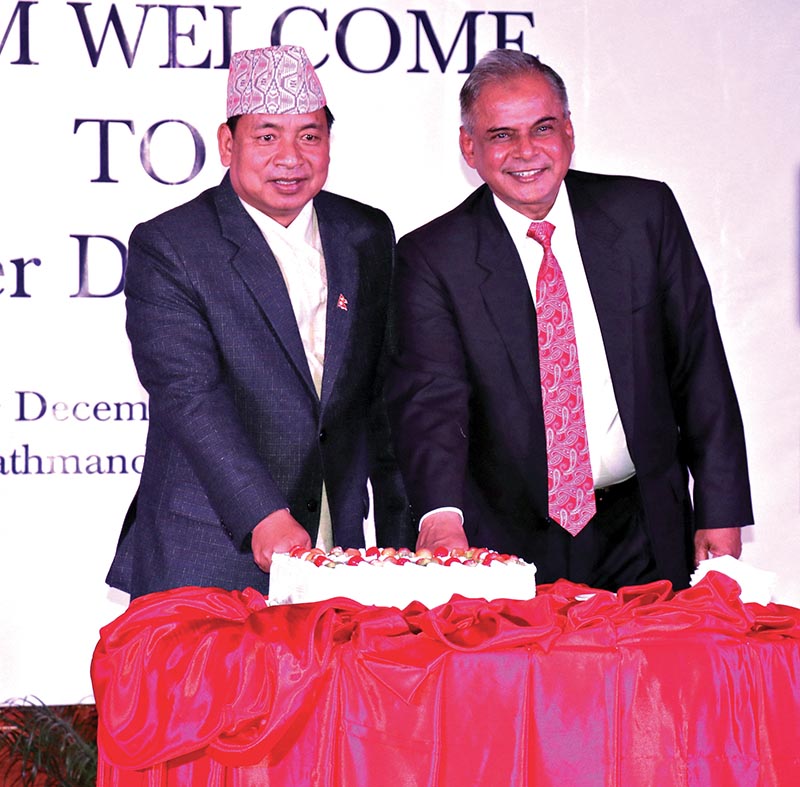 Vice-president Nanda Bahadur Pun cutting cake at a function held to mark 33rd SAARC Anniversary, in Kathmandu, on Friday. Photo: RSS