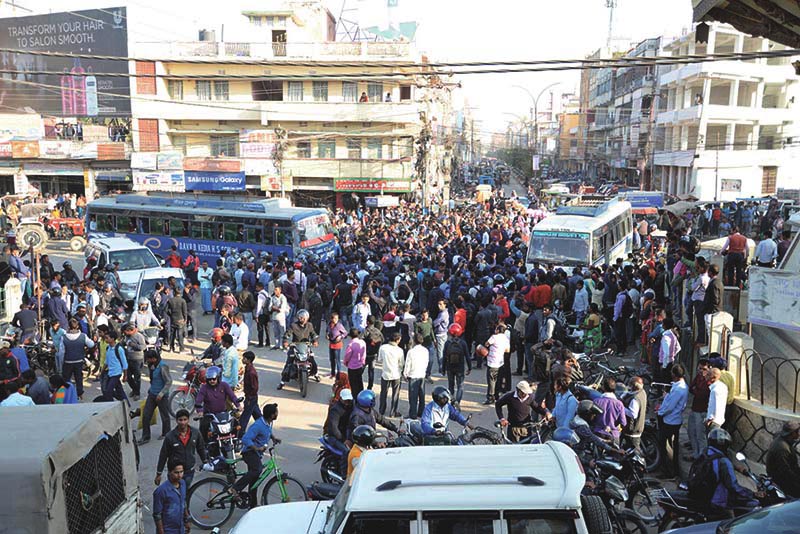 Temporary police personnel obstructing the road in protest against the government move to prematurely terminate their employment contract, in Birgunj, on Thursday, December 14, 2017. Photo: THT